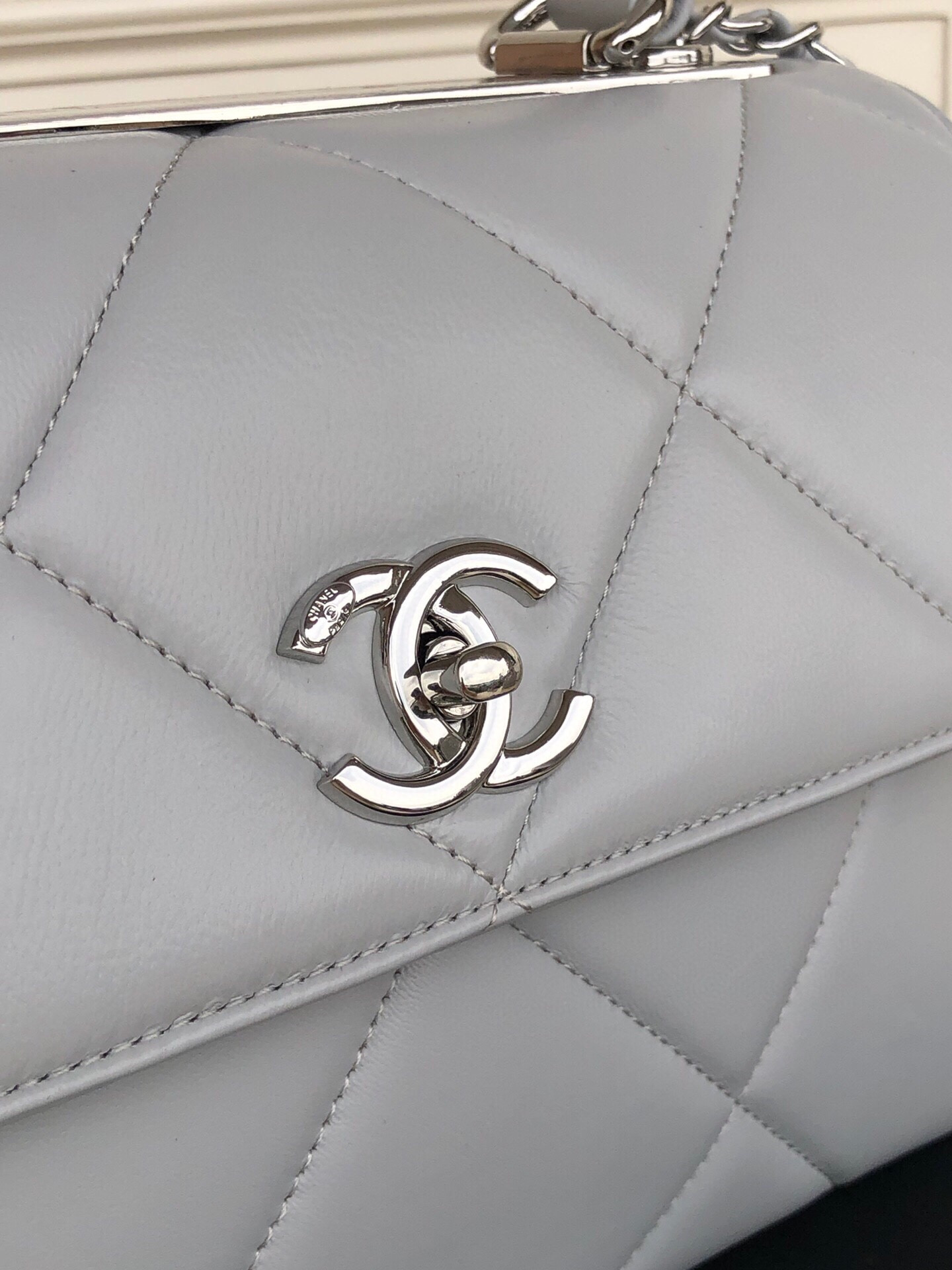 Ch*el flap bag with top handle 6.6 × 9.8 × 4.7 in